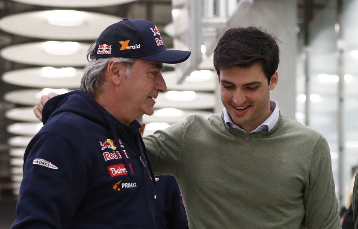 Carlos Sainz greets his father, Carlos snr, after his victory in the Dakar Rally. Madrid January 2020.