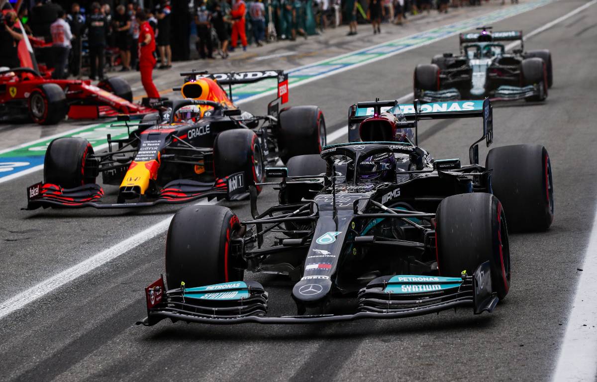 Max Verstappen [Red Bull] and Lewis Hamilton [Mercedes] in the pit lane at the Italian GP. September 2021.