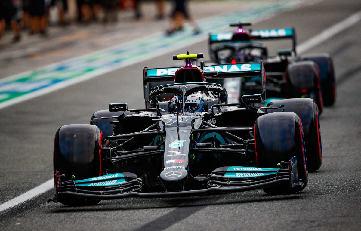 Valtteri Bottas and Lewis Hamilton leave the pit-lane. Italy September 2021