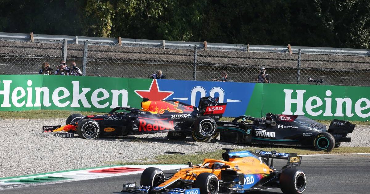 Lewis Hamilton and Max Verstappen in the gravel as Daniel Ricciardo drives past. Monza September 2021.
