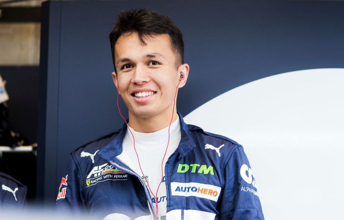 Alex Albon smiles in his DTM garage. September 2021.