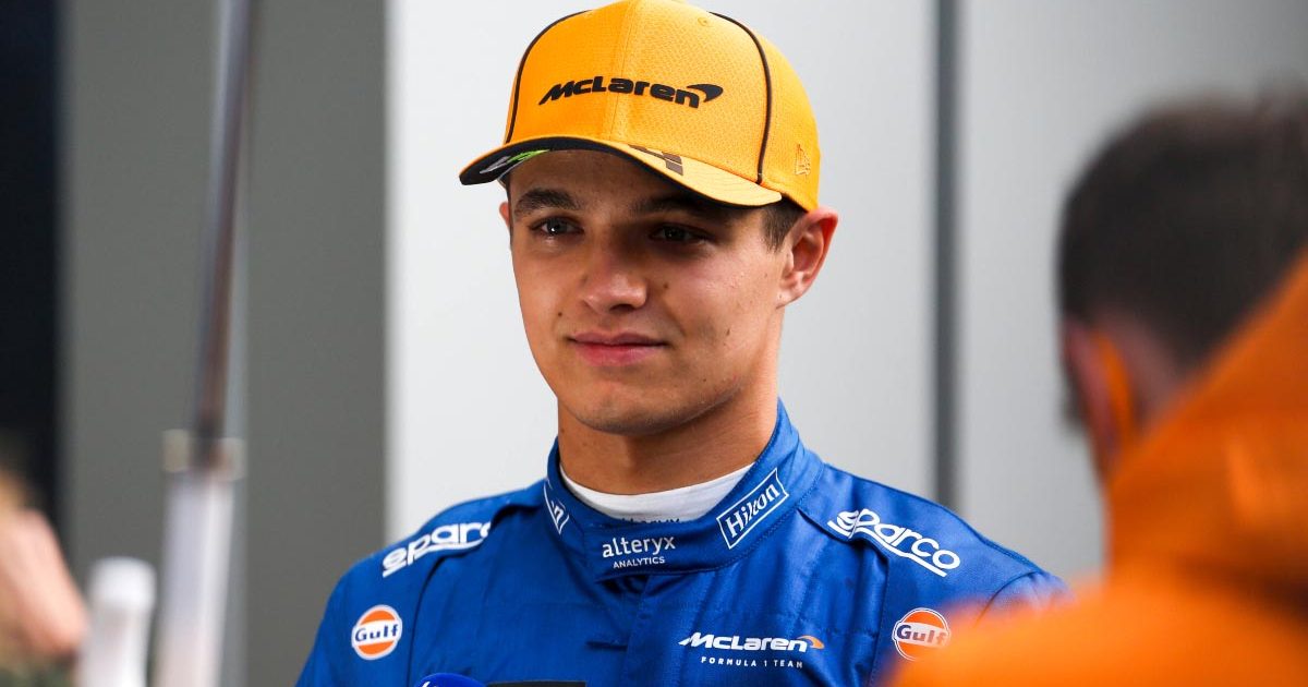 Lando Norris gives an interview in Russia.