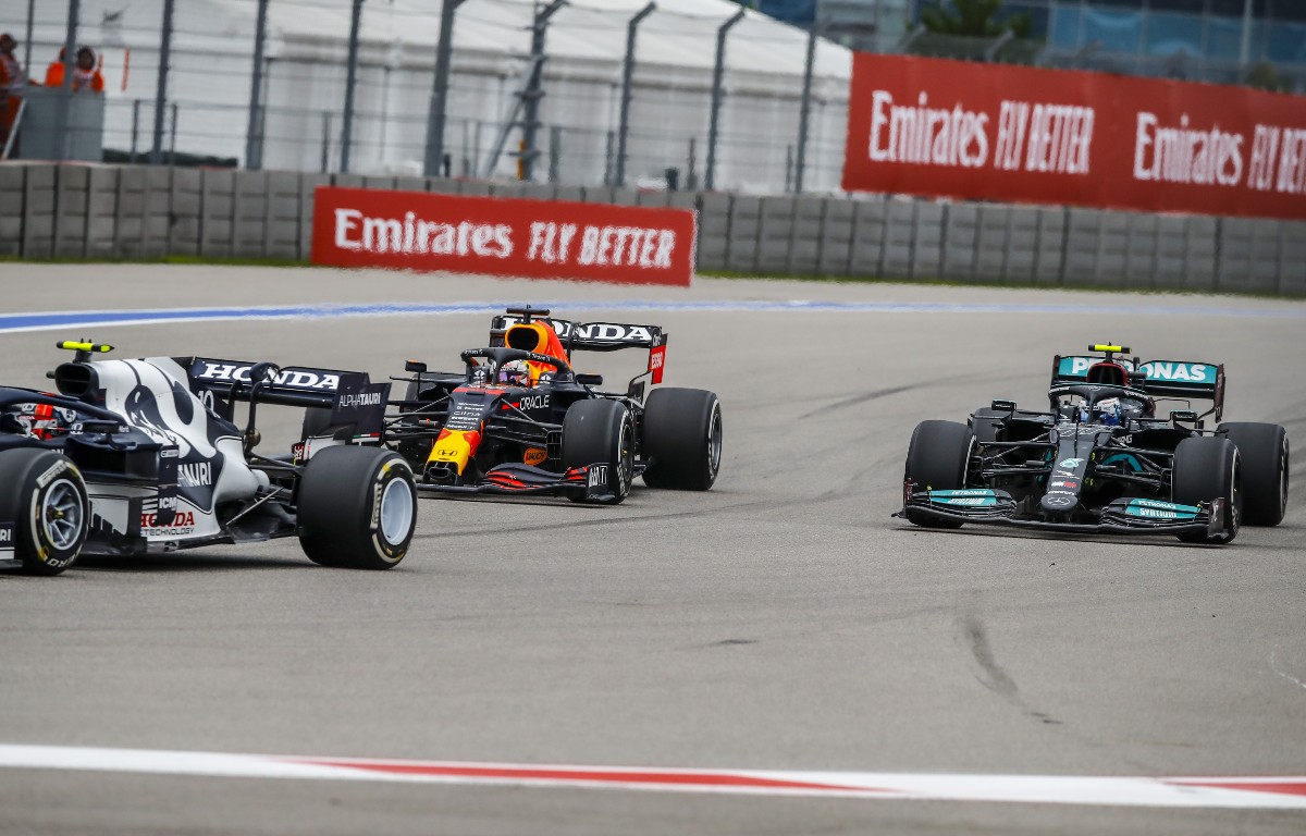 Max Verstappen passes Valtteri Bottas in the Russian Grand Prix. September 2021.