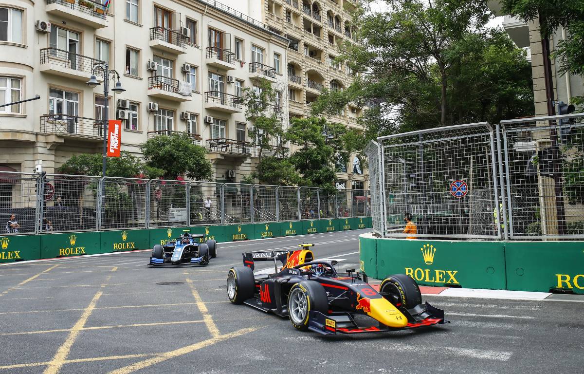 Juri Vips ahead of Felipe Drugovich in an F2 race. Baku June 2021.