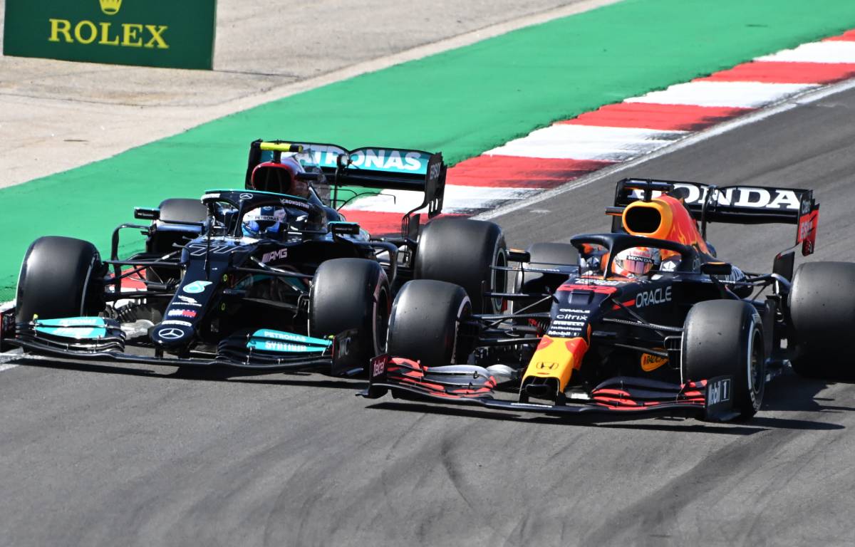 Max Verstappen passes Valtteri Bottas during the Portuguese GP. Portimao May 2021.