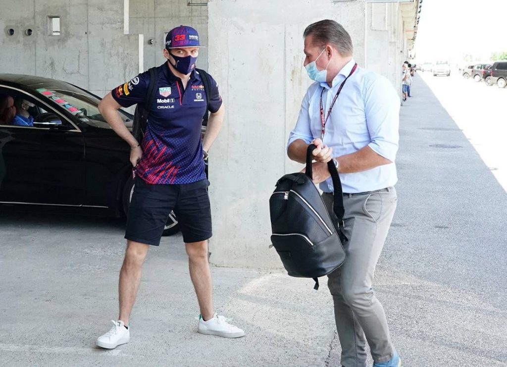 Max and Jos Verstappen in a car park at the Hungarian GP. Hungaroring July 2021.