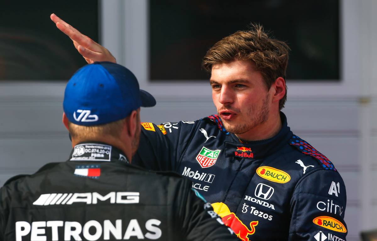 Max Verstappen chatting with Valtteri Bottas. Red Bull Ring July 2021.