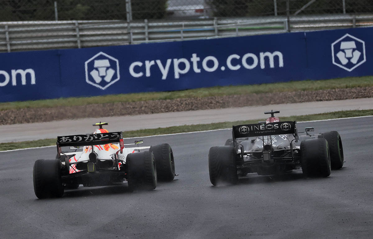 Mercedes driver Lewis Hamilton attempts to overtake Sergio Perez. Turkey, October 2021.
