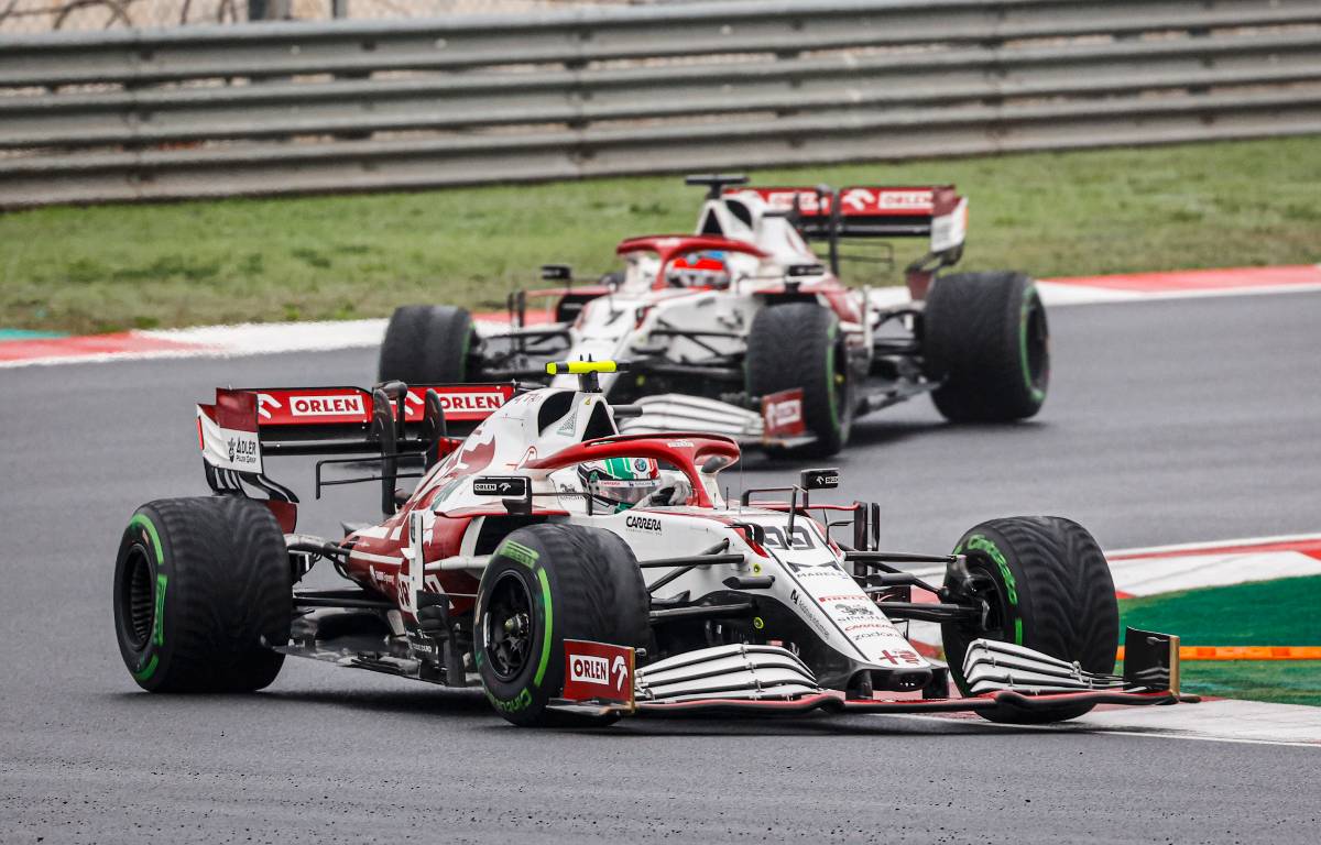 Antonio Giovinazzi leads Alfa Romeo team-mate Kimi Raikkonen. Turkey, October 2021.