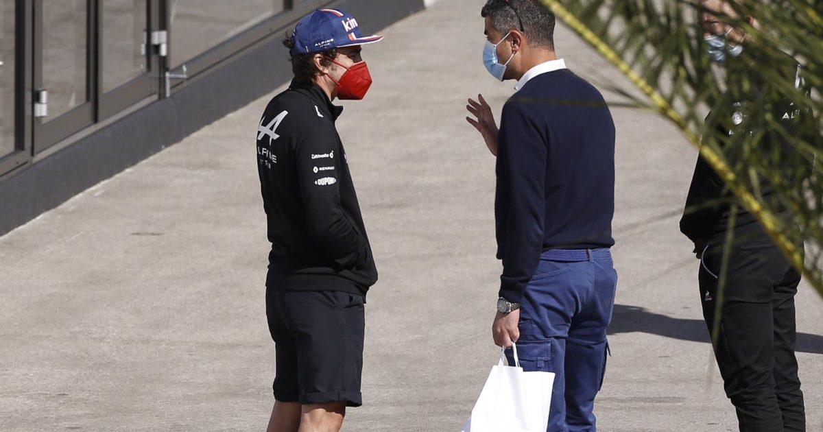 Fernando Alonso and Michael Masi chat. Turkey October 2021.
