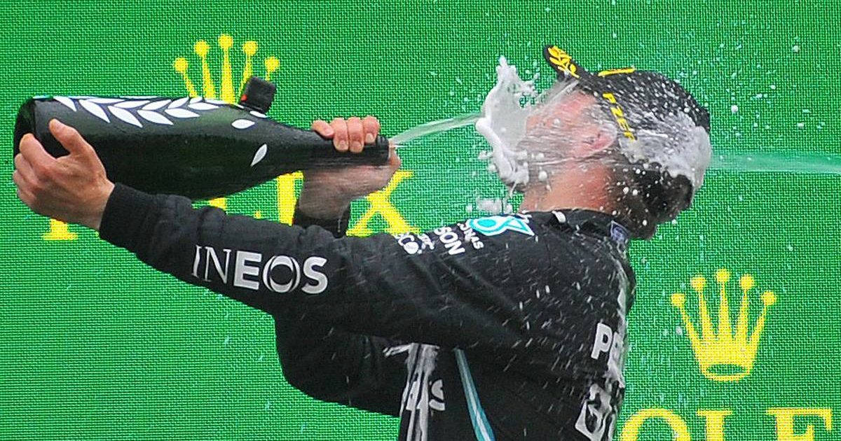 Valtteri Bottas, Mercedes, takes a face full of champagne. Turkey, October 2021.