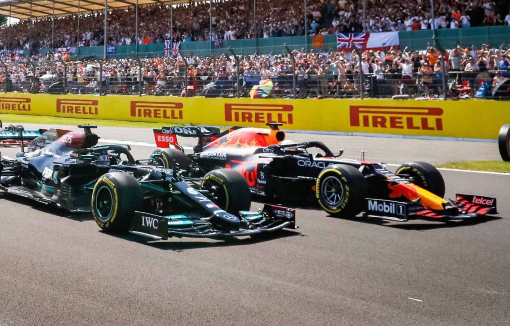 Lewis Hamilton and Max Verstappen about to crash at Abbey. Silverstone July 2021.