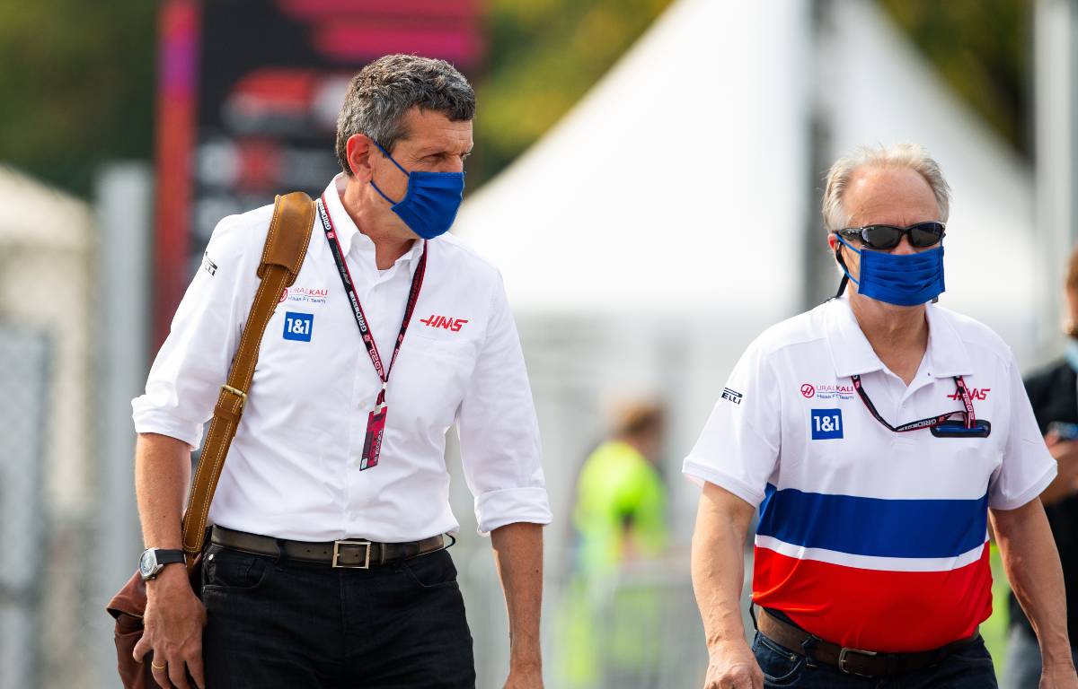 Guenther Steiner walking with Gene Haas. Monza September 2021.