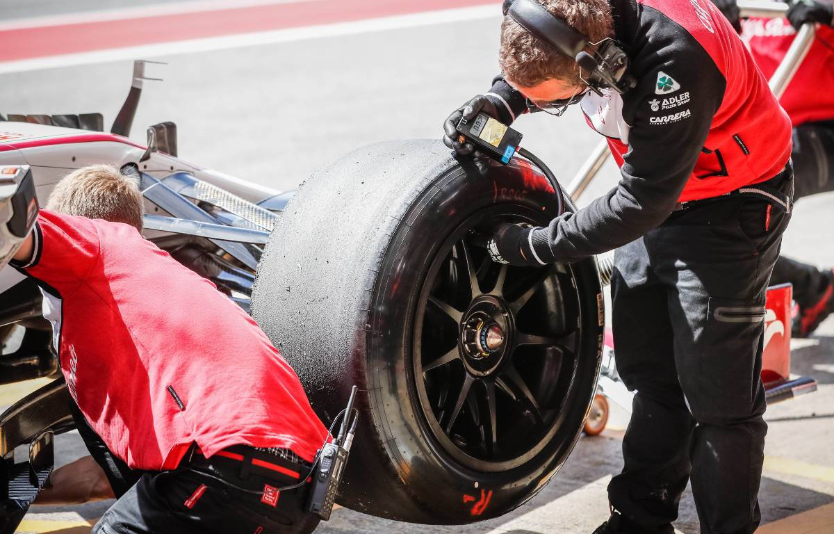 Alfa Romeo work on an 18-inch Pirelli tyre. Spain, May 2021.