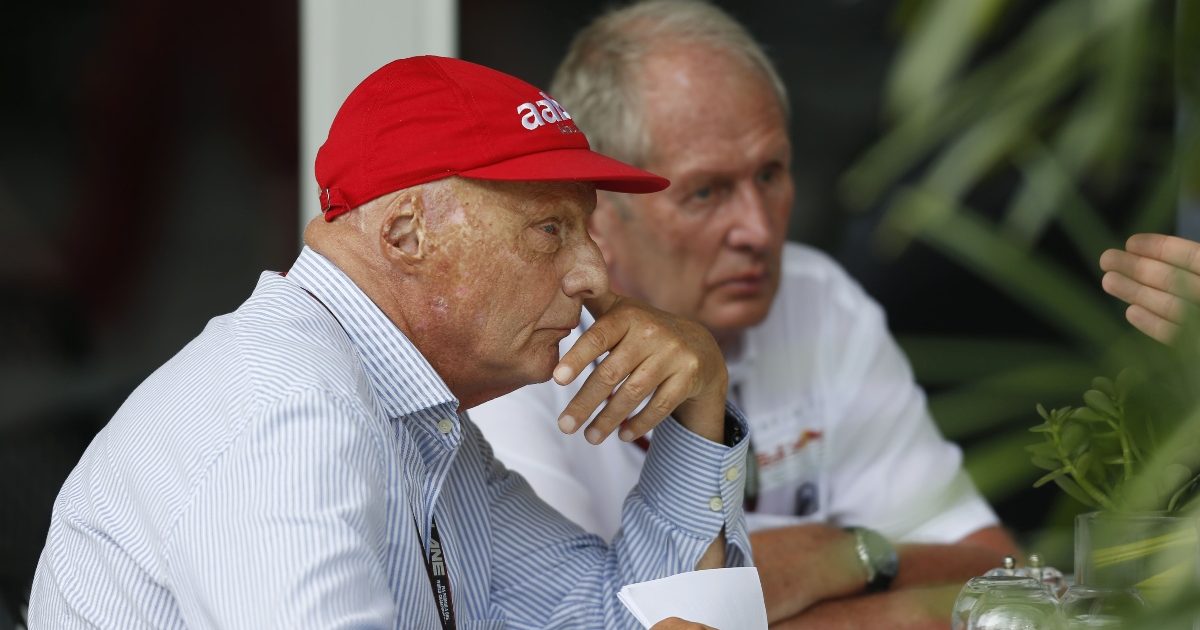 Niki Lauda and Helmut Marko sitting at a table. Malaysia March 2013.