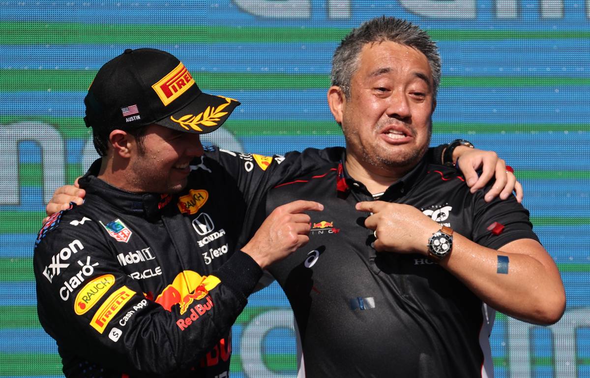 Sergio Perez and Masashi Yamamoto on the podium after the US Grand Prix. Austin October 2021.