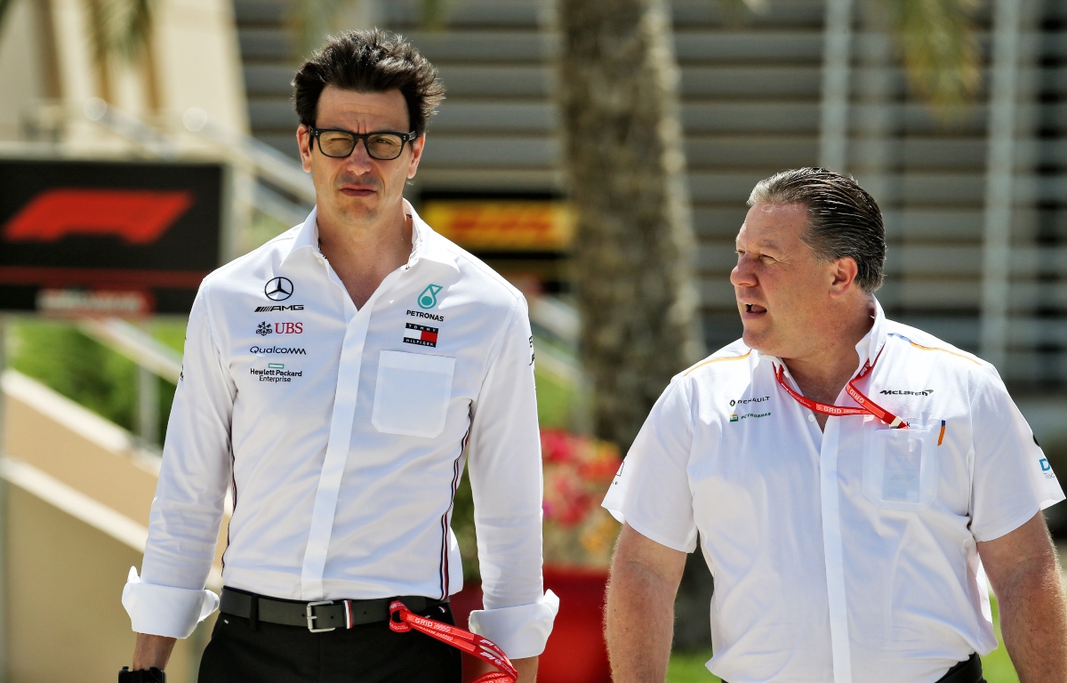 Zak Brown and Toto Wolff walking and talking. Bahrain March 2019