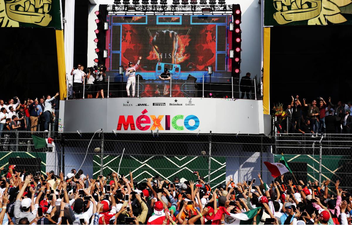 Mexican GP fans cheer Sergio Perez on the podium. Mexico City October 2017.