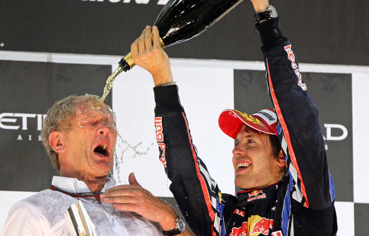Helmut Marko and Sebastian Vettel celebrate. Abu Dhabi 2010.