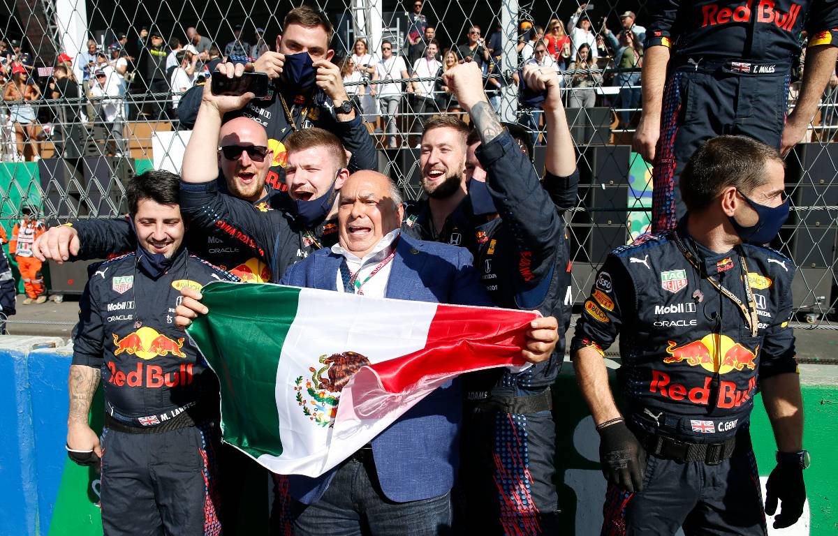 Sergio Perez's father leads the Red Bull celebrations after the Mexican GP. Mexico City November 2021.