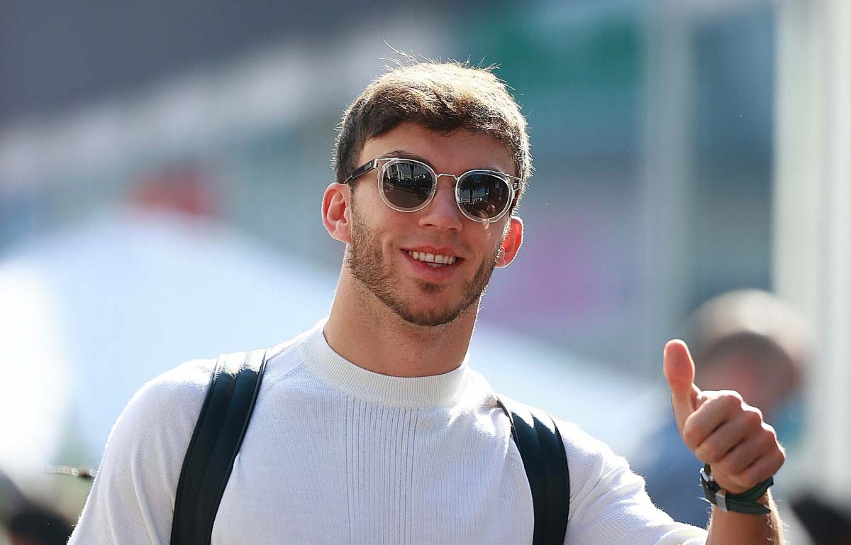 Pierre Gasly gives a thumbs-up in the paddock. Mexico November 2021.