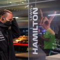 Lewis Hamilton walks past a picture of himself. Brazil November 2021