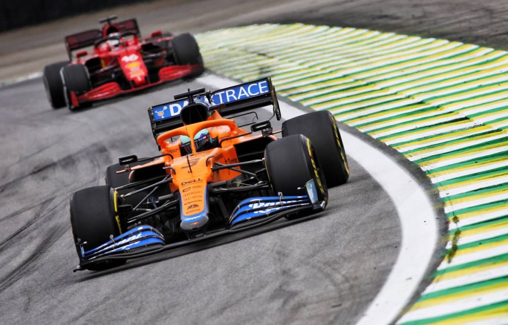 Daniel Ricciardo, McLaren, ahead of Ferrari. Brazil, November 2021.