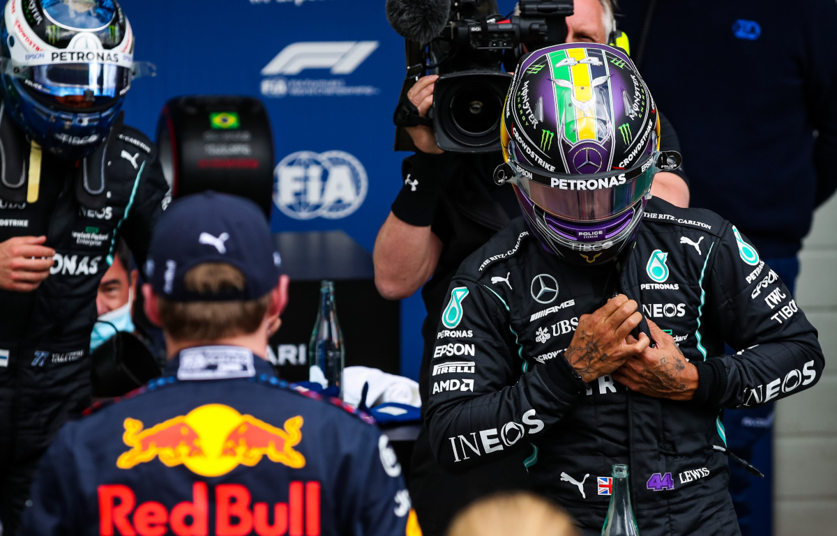 Lewis Hamilton walks towards Max Verstappen. Brazil November 2021