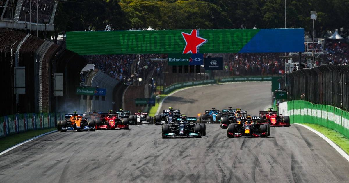 Lando Norris and Carlos Sainz tangle at the start. Brazil, November 2021.