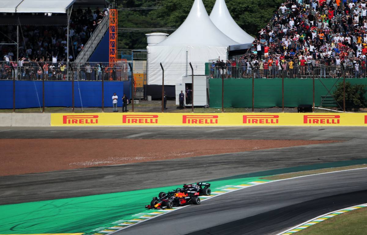 Max Verstappen pushes Lewis Hamilton wide. Brazil, November 2021.