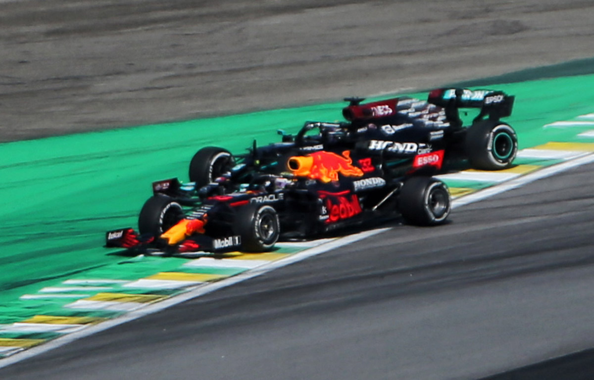 Max Verstappen and Lewis Hamilton about to run wide. Brazil November 2021