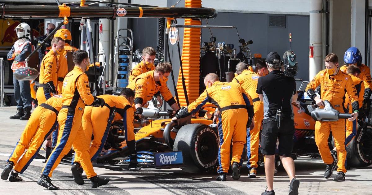 Daniel Ricciardo's McLaren is wheeled into the garage at the Sao Paulo GP. Interlagos November 2021.