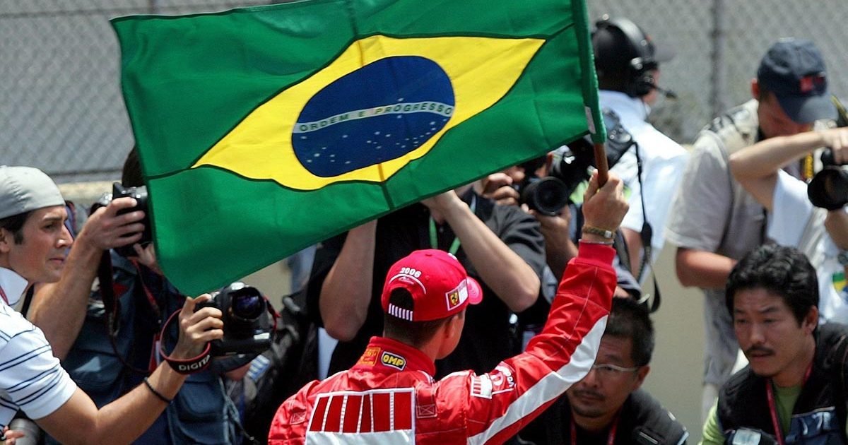 Michael Schumacher waves Brazilian flag. 2006 Interlagos