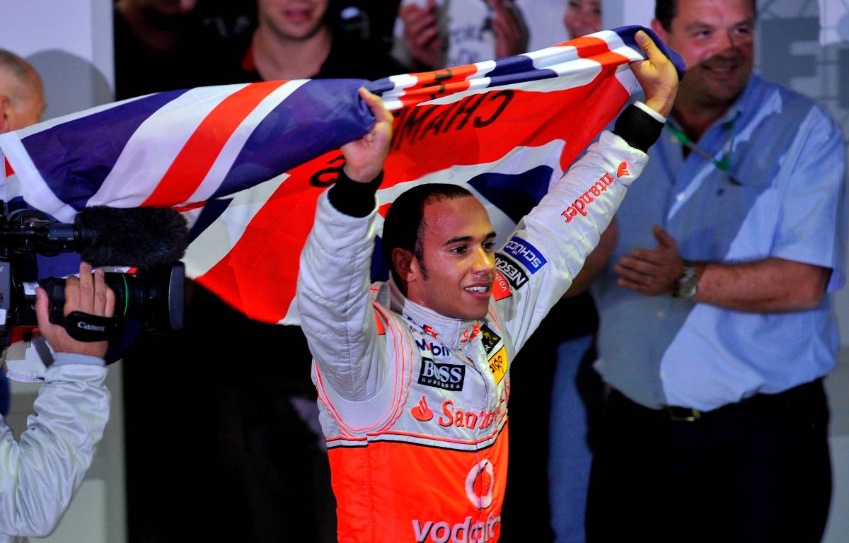 Lewis Hamilton celebrates after winning his first F1 world title. Interlagos November 2008.