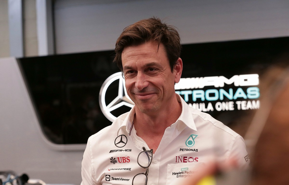 Toto Wolff smiles in front of the Mercedes garage. Brazil, November 2021.