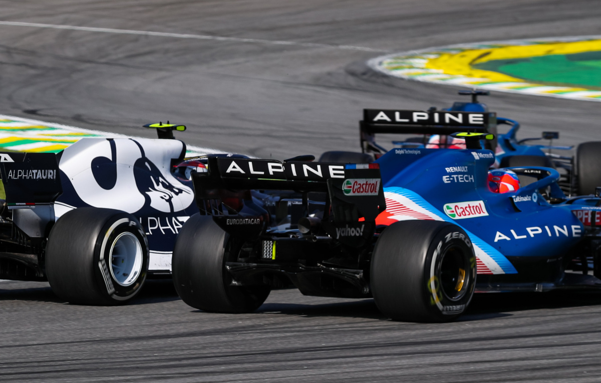 Pierre Gasly racing Esteban Ocon and Fernando Alonso. Brazil November 2021