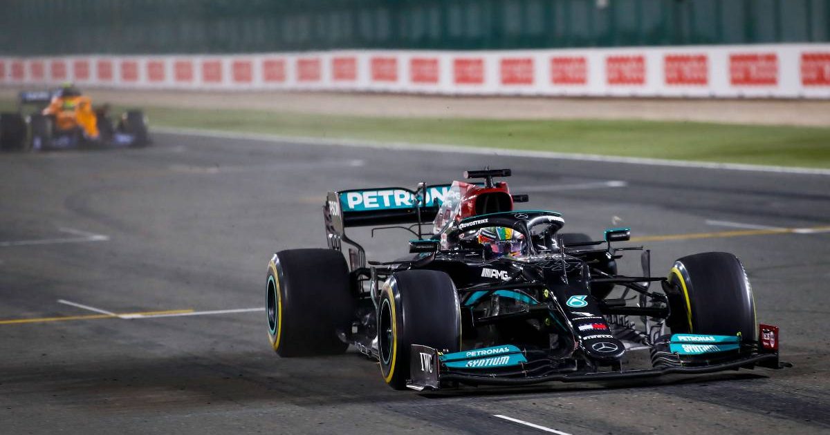 Lewis Hamilton clear of a McLaren during the Qatar GP. Lusail November 2021.