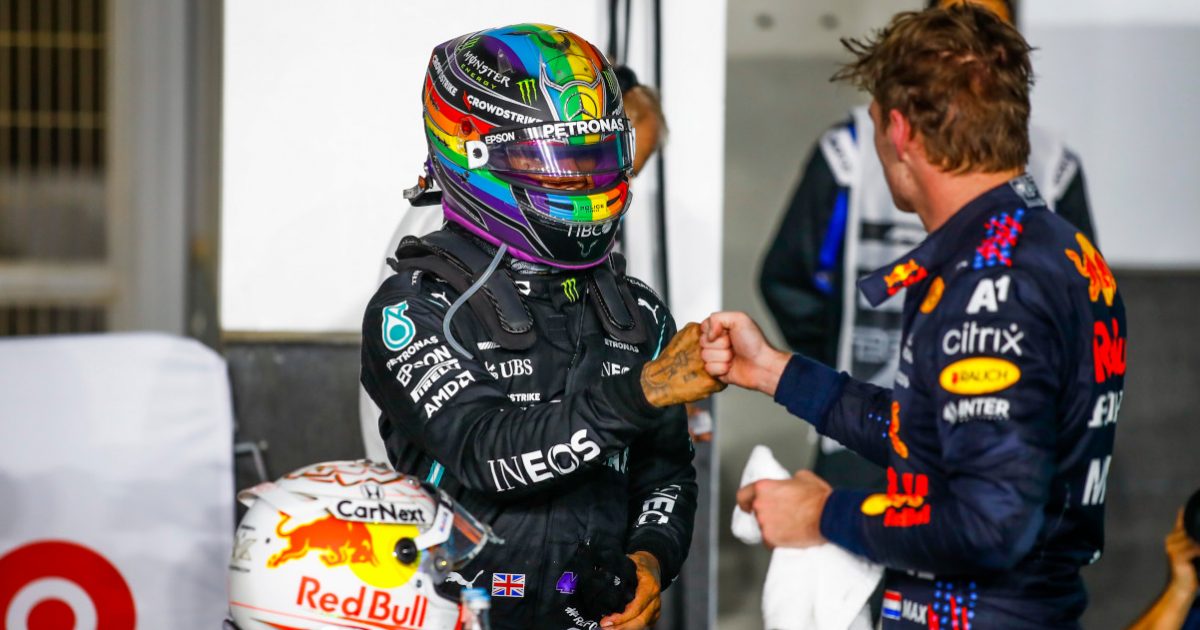 Lewis Hamilton and Max Verstappen bump fists. Qatar November 2021