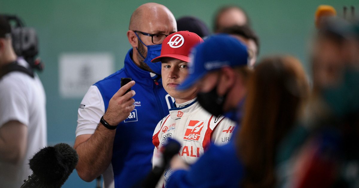 Nikita Mazepin looks over at Mick Schumacher. Qatar November 2021