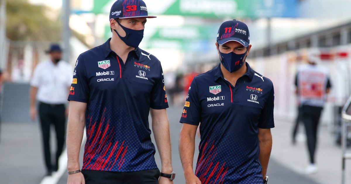Max Verstappen and Sergio Perez, Red Bull, walk and talk. Qatar, November 2021.