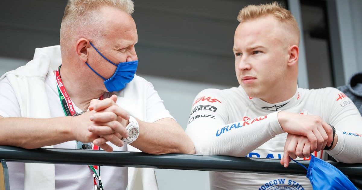 Haas sponsor and driver Dmitry and Nikita Mazepin talking at the Monaco GP. Monte Carlo May 2021.