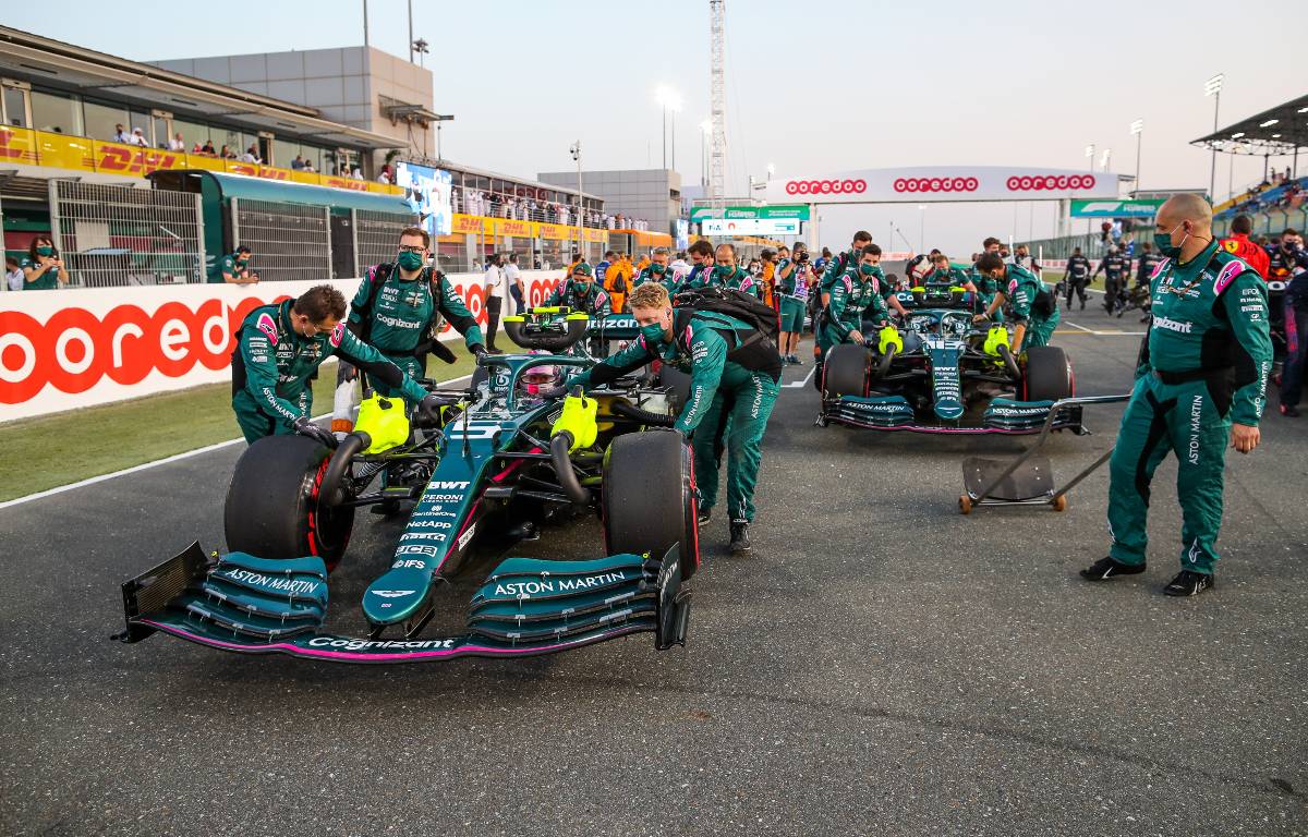 Sebastian Vettel and Lance Stroll, Aston Martin, moved into their grid slots. Qatar, November 2021.