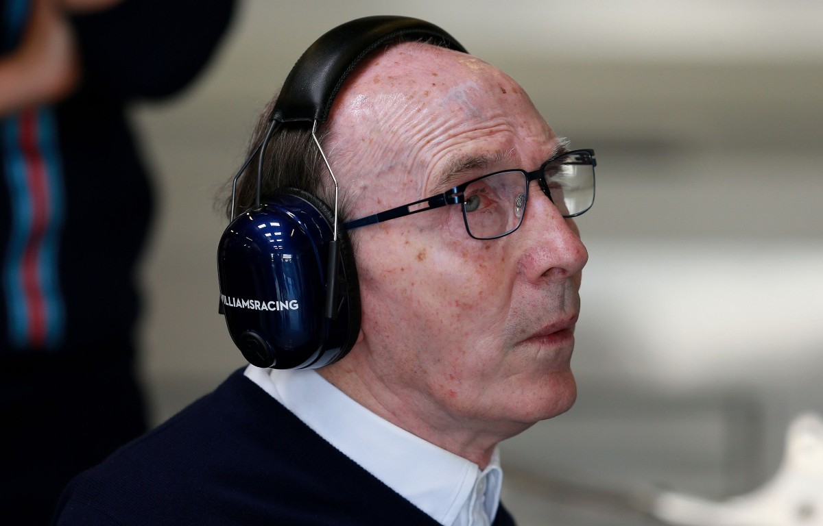 Sir Frank Williams wearing team headphones. England, July 2014.