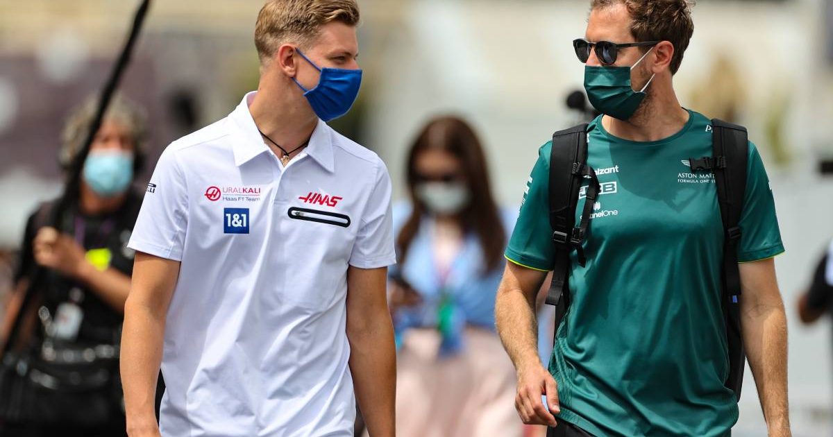 Mick Schumacher and Sebastian Vettel walking and talking. Baku June 2021.