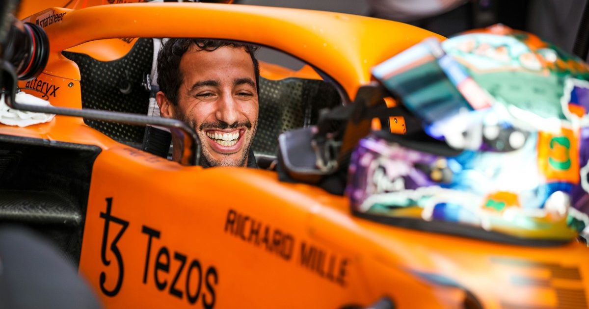 Daniel Ricciardo smiling as he sits in the McLaren. Qatar, November 2021.