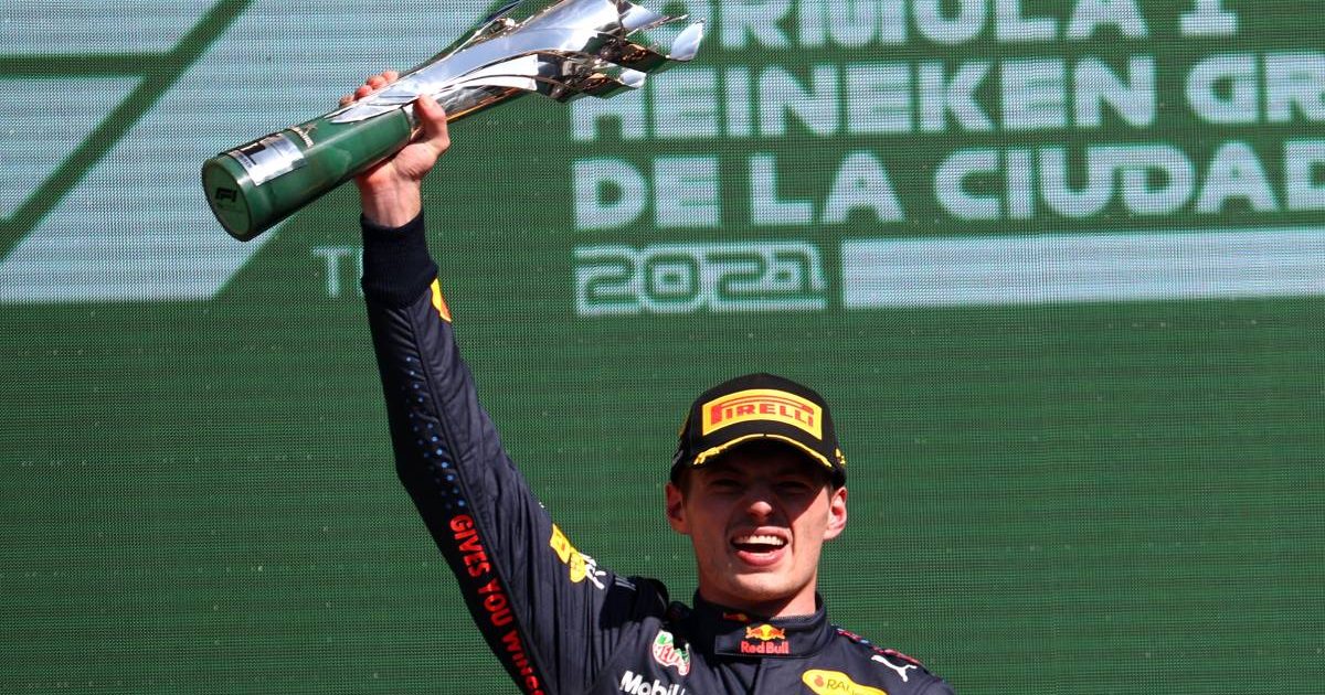 Max Verstappen holds the trophy after winning the Mexican GP. Mexico City October 2021.
