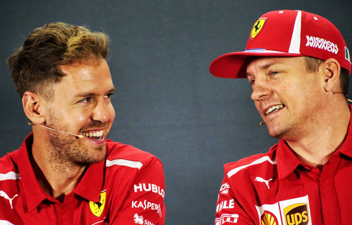 Sebastian Vettel and Kimi Raikkonen smiling during a press conference. Yas Marina November 2018.