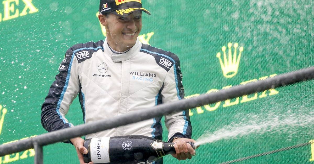 George Russell spraying the fizz after finishing second in the Belgian GP. Spa-Francorchamps August 2021.