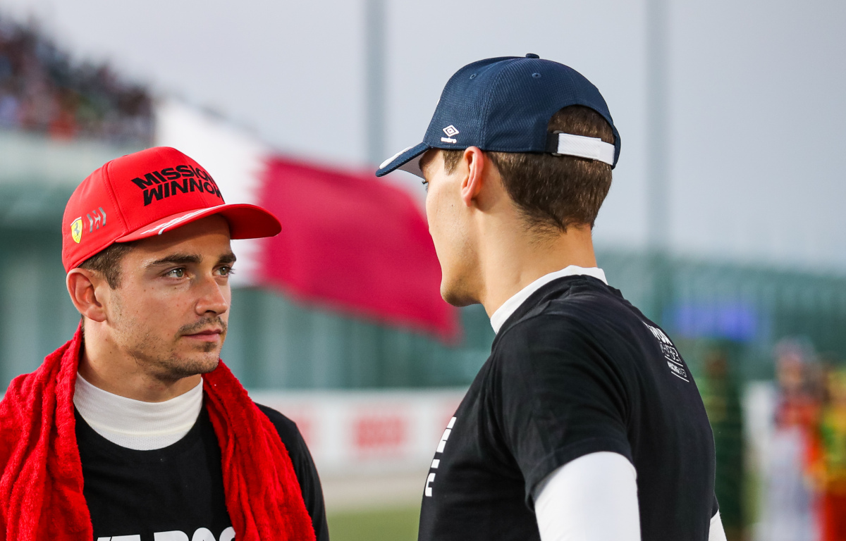 Charles Leclerc and George Russell speaking. Qatar November 2021