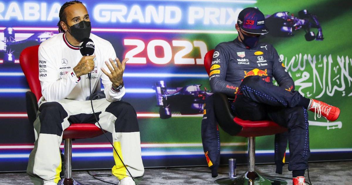 Lewis Hamilton, Mercedes, talks, Max Verstappen, Red Bull, head down. Saudi Arabia, December 2021.